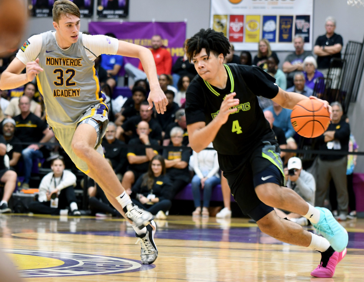 Prolific Prep sophomore guard Tyran Strokes drives to the basket while Montverde Academy senior Cooper Flagg (32) defends during the MAIT championship game on Jan. 27, 2024.